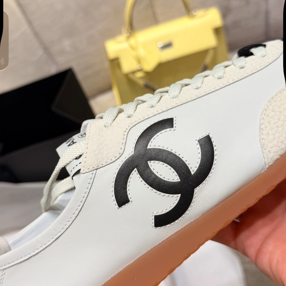 CHANEL White and Black Logo Sneakers